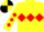 Yellow, red triple diamond, red diamonds on sleeves, yellow & black quartered cap