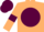 Beige body, garnet disc, beige arms, garnet armlets, garnet cap, beige hooped
