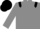 Grey body, black epaulettes, grey arms, black cap