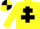 Yellow body, black cross of lorraine, yellow arms, yellow cap, black quartered