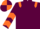 Maroon, orange epaulettes, orange chevrons on sleeves, quartered cap