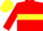 Red body, yellow hoop, red arms, yellow cap