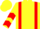 Yellow, red braces, yellow, red chevrons sleeves, yellow, red diamond cap