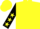 Bright yellow and red checks, black sleeves, bright yellow stars, bright yellow cap,red peak