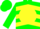 Green, yellow ball, yellow chevrons on green sleeves, green cap