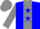 Blue, grey panel, blue stars on grey sleeves, grey cap