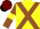 Yellow, brown cross belts, brown sleeves, yellow armlets, black and red check cap