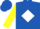 Royal blue, white 'gem' in white diamond, royal blue bars on yellow sleeves, royal blue cap