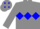 Grey body, blue triple diamond, grey arms, grey cap, blue diamonds