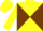 Yellow and chocolate diagonal quarters, chocolate armlets on yellow sleeves, yellow cap