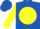 Royal blue, pink 'd' on yellow ball, pink hearts on yellow sleeves, royal blue cap