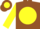 Brown, brown 'e'on yellow ball, brown bars on yellow sleeves