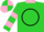 Lime green, black circle,pink collar and cuffs, pink hoops on sleeves, lime green and pink quartered cap