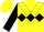 Yellow, black diamond hoop, black 'c' in diamond frame, black diamond chevron on sleeves