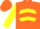Orange, black lily on yellow ball, orange chevrons on yellow slvs