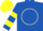 Royal blue, white circle, yellow hoops on sleeves, yellow cap