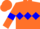 Orange body, blue diamond hoop, orange arms, blue armlets, orange cap, blue hoops