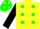 Yellow body, ligth green spots, black arms, ligth green cap, yellow spots