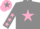 Grey body, pink star, grey arms, pink stars, pink cap, grey star
