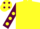 Yellow, maroon sleeves, yellow spots, yellow cap, maroon spots
