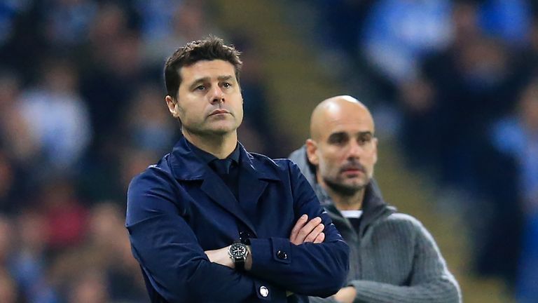 Mauricio Pochettino and Pep Guardiola look on from the touchline late in the second-half of Manchester City vs Tottenham Hotspur in the Champions League