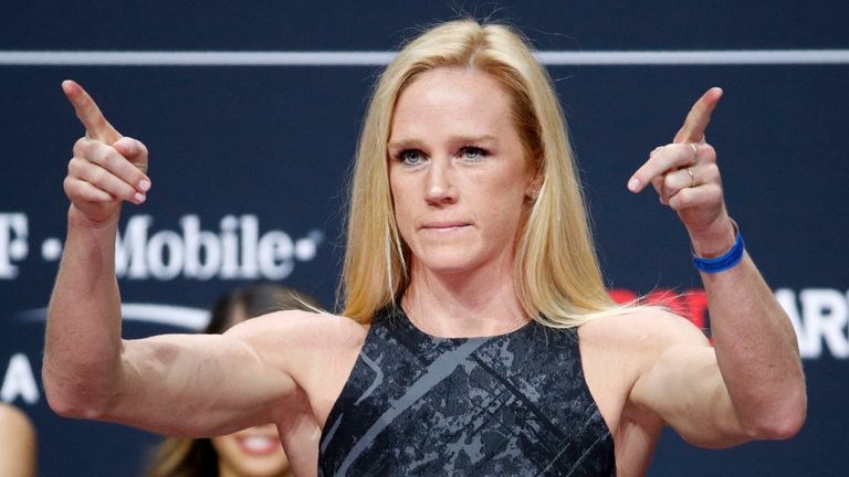 Holly Holm poses during a ceremonial weigh-in for the UFC 246 mixed martial arts bout, Friday, Jan. 17, 2020, in Las Vegas. Holm is scheduled to fight Raquel Pennington in a women's bantamweight bout Saturday in Las Vegas (AP Photo/John Locher)