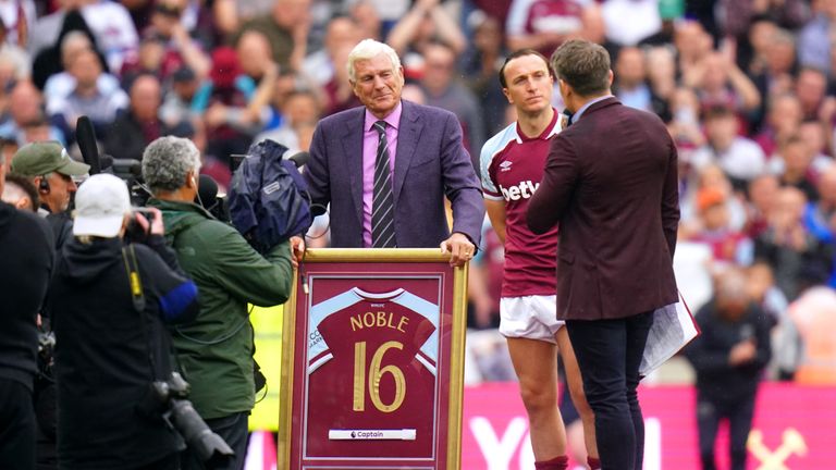 Former West Ham United player Trevor Brooking (left) presents West Ham United&#39;s Mark Noble with a framed shirt to mark his last home game for the club at the end of the Premier League match at London Stadium, London.