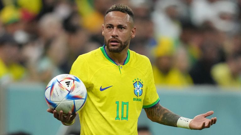 Neymar gestures towards the assistant referee during Brazil's World Cup clash with Serbia