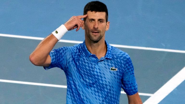 Novak Djokovic of Serbia celebrates after defeating Stefanos Tsitsipas of Greece during the men&#39;s singles final at the Australian Open tennis championship in Melbourne, Australia, Sunday, Jan. 29, 2023. (AP Photo/Mark Baker)