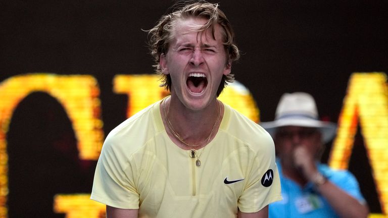 Sebastian Korda of the U.S. celebrates after defeating Hubert Hurkacz of Poland during their fourth round match at the Australian Open tennis championship in Melbourne, Australia, Sunday, Jan. 22, 2023. (AP Photo/Aaron Favila)