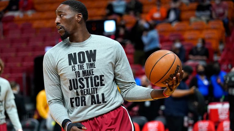 Miami Heat center Bam Adebayo wears a shirt commemorating Martin Luther King Jr. day