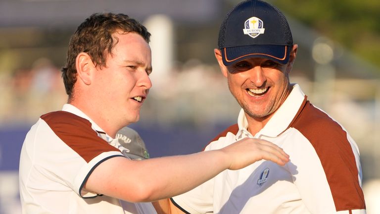 Europe&#39;s Justin Rose, right and Europe&#39;s Robert Macintyre celebrate on the 16th green after winning their afternoon Fourballs match 3&2 at the Ryder Cup golf tournament at the Marco Simone Golf Club in Guidonia Montecelio, Italy, Saturday, Sept. 30, 2023. (AP Photo/Gregorio Borgia )