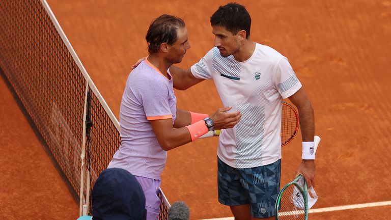 Rafael Nadal of Spain and Pedro Cachin of Argentina embrace following their Men&#39;s Round of 32 match during day seven of the Mutua Madrid Open at La Caja Magica on April 29, 2024 in Madrid, Spain. (Photo by Clive Brunskill/Getty Images)