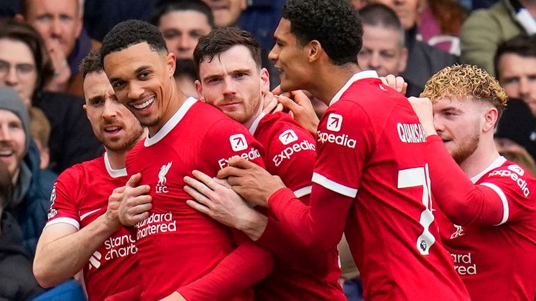 Liverpool&#39;s Trent Alexander-Arnold celebrates with team-mates after scoring (AP)