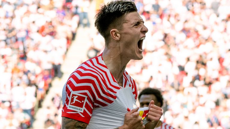 Leipzig's Benjamin Sesko celebrates after scoring his side's first goal during German Bundesliga soccer match between RB Leipzig and Werder Bremen in Leipzig, Germany, Saturday, May 11, 2024. (Hendrik Schmidt/dpa via AP)