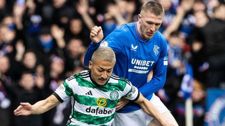 GLASGOW, SCOTLAND - APRIL 07: Rangers&#39; John Lundstram (R) and Celtic&#39;s Daizen Maeda in action during a cinch Premiership match between Rangers and Celtic at Ibrox Stadium, on April 07, 2024, in Glasgow, Scotland. (Photo by Alan Harvey / SNS Group)