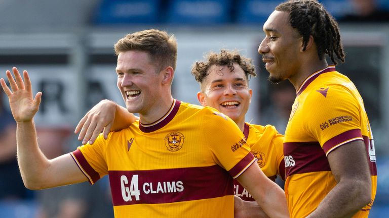 DINGWALL, SCOTLAND - MAY 11: Motherwell&#39;s Blair Spittal (L) celebrates scoring to make it 3-1 with teammates Theo Bair (R) and Davor Zdravkovski (C) during a cinch Premiership match between Ross County and Motherwell at the Global Energy Stadium, on May 11, 2024, in Dingwall, Scotland. (Photo by Mark Scates / SNS Group)