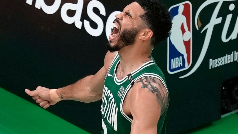 Boston Celtics&#39; Jayson Tatum celebrates after scoring during the first half of Game 5 of the NBA basketball finals against the Dallas Mavericks, Monday, June 17, 2024, in Boston. (AP Photo/Michael Dwyer)