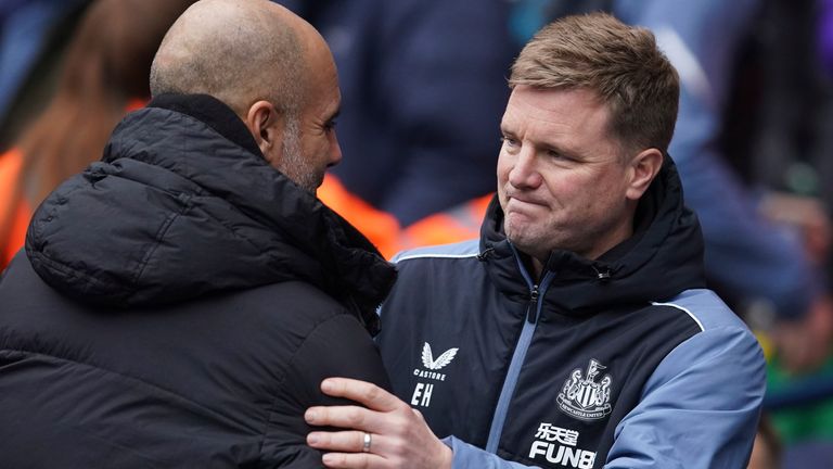 Manchester City&#39;s head coach Pep Guardiola, right, hugs with Newcastle&#39;s head coach Eddie Howe during the English Premier League soccer match between Manchester City and and Newcastle, at the Etihad stadium in Manchester, England, Saturday, March 4, 2023. (AP Photo/Dave Thompson)