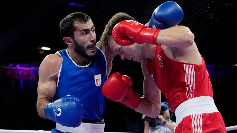 Britain&#39;s Lewis Richardson, right, fights Serbia&#39;s Vakhid Abbasov in their men&#39;s 71 kg preliminary boxing match at the 2024 Summer Olympics, Wednesday, July 31, 2024, in Paris, France. (AP Photo/Ariana Cubillos)