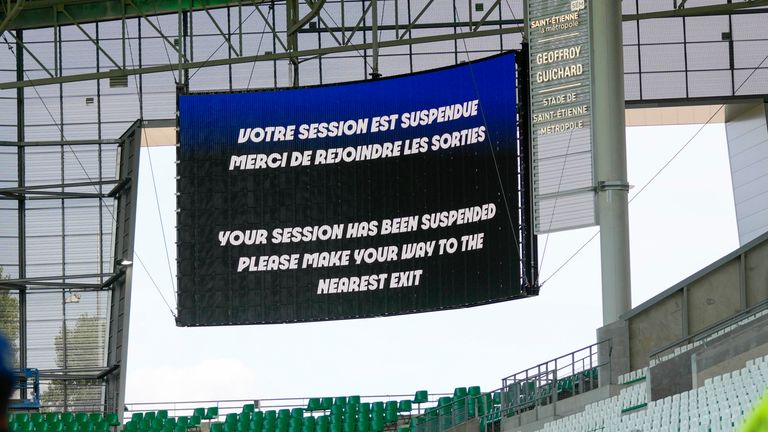 The video screen announces that the match has been suspended during the men&#39;s Group B soccer match between Argentina and Morocco at Geoffroy-Guichard Stadium at the 2024 Summer Olympics, Wednesday, July 24, 2024, in Saint-Etienne, France. (AP Photo/Silvia Izquierdo)