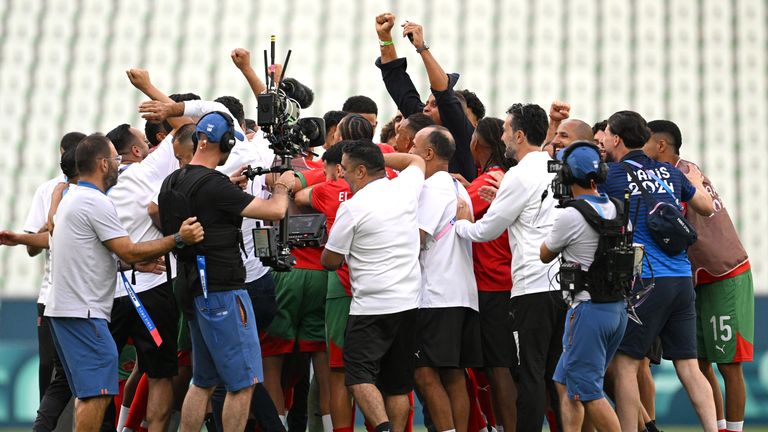 SAINT-ETIENNE, FRANCE - JULY 24: Players from Team Morocco celebrates following the team&#39;s victory in the Men&#39;s group B match between Argentina and Morocco during the Olympic Games Paris 2024 at Stade Geoffroy-Guichard on July 24, 2024 in Saint-Etienne, France. (Photo by Tullio M. Puglia/Getty Images)