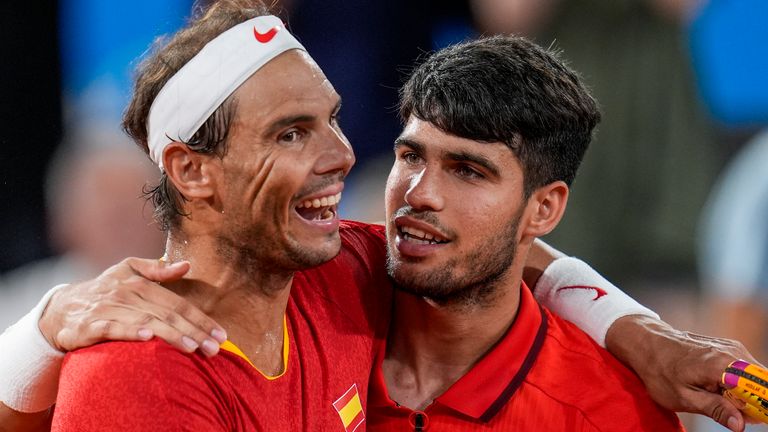 Rafael Nadal, left, and Carlos Alcaraz of Spain react after losing against Austin Krajicek and Rajeev Ram of the USA during the men&#39;s doubles quarter-final tennis competition at the Roland Garros stadium, at the 2024 Summer Olympics, Wednesday, July 31, 2024, in Paris, France. (AP Photo/Manu Fernandez) 