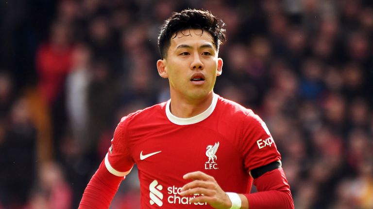 Liverpool&#39;s Wataru Endo during the English Premier League soccer match between Liverpool and Brighton & Hove Albion at Anfield, in Liverpool, England, Sunday March 31, 2024. (AP Photo/Rui Vieira)