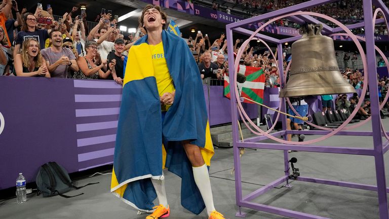 Armand Duplantis, of Sweden, reacts after setting a new world record in the men&#39;s pole vault final at the 2024 Summer Olympics, Monday, Aug. 5, 2024, in Saint-Denis, France. (AP Photo/Bernat Armangue)