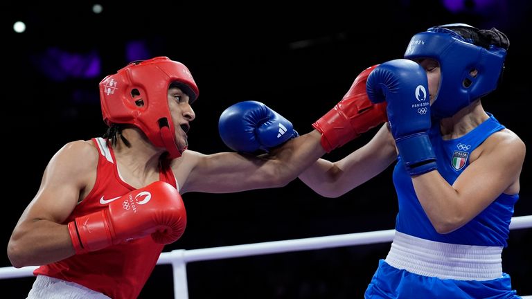 Algeria&#39;s Imane Khelif, left, fights Italy&#39;s Angela Carini in their women&#39;s 66kg preliminary boxing match at the 2024 Summer Olympics, Thursday, Aug. 1, 2024, in Paris, France. (AP Photo/John Locher)