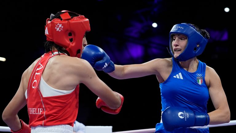 Algeria&#39;s Imane Khelif, left, fights Italy&#39;s Angela Carini in their women&#39;s 66kg preliminary boxing match at the 2024 Summer Olympics, Thursday, Aug. 1, 2024, in Paris, France. (AP Photo/John Locher)