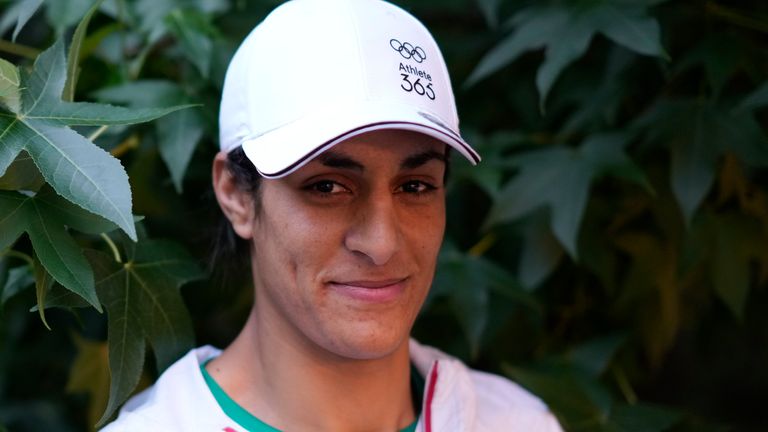 Algerian boxer Imane Khelif poses for a photo after an interview with SNTV at the 2024 Summer Olympics, Sunday, Aug. 4, 2024, in Paris, France. (AP Photo/Vadim Ghirda) 