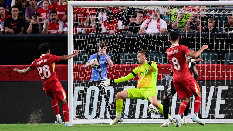 Liverpool&#39;s Fabio Carvalho (28) scores a goal past Arsenal goalkeeper Karl Hein, center, during the first half of an international friendly soccer match, Wednesday, July 31, 2024, in Philadelphia. (AP Photo/Derik Hamilton)