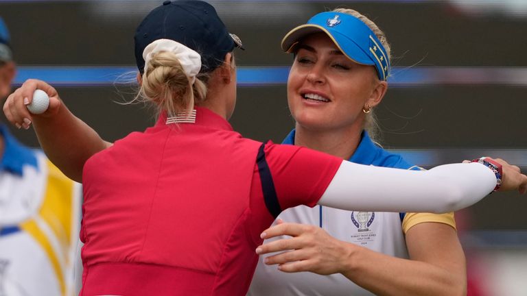 Europe&#39;s Charley Hull, right, congratulates United States&#39; Nelly Korda on the 16th hole after the United States&#39; victory during a Solheim Cup golf tournament foursomes match at Robert Trent Jones Golf Club, Friday, Sept. 13, 2024, in Gainesville, Va. (AP Photo/Matt York)